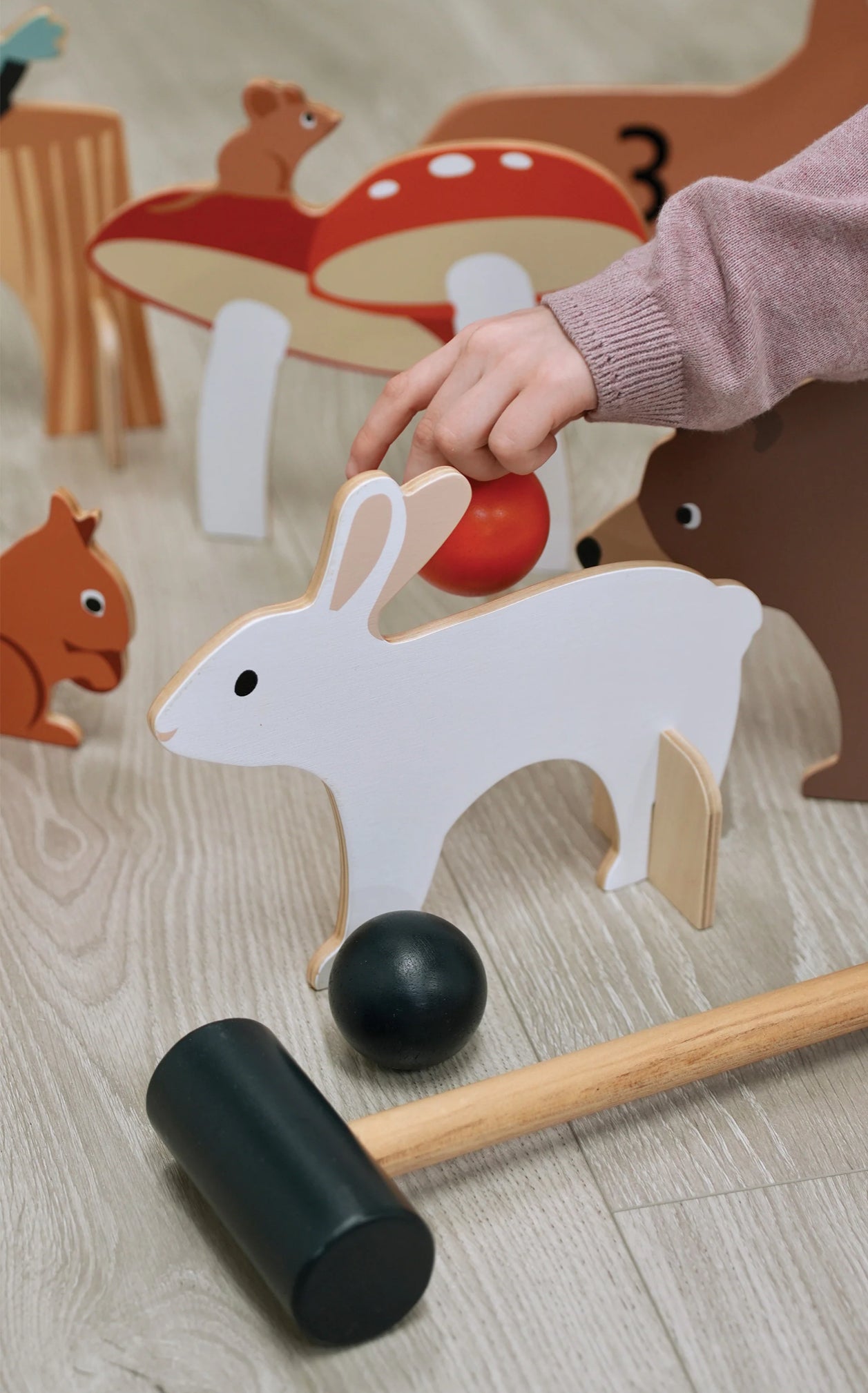 Juego de croquet con animales del bosque