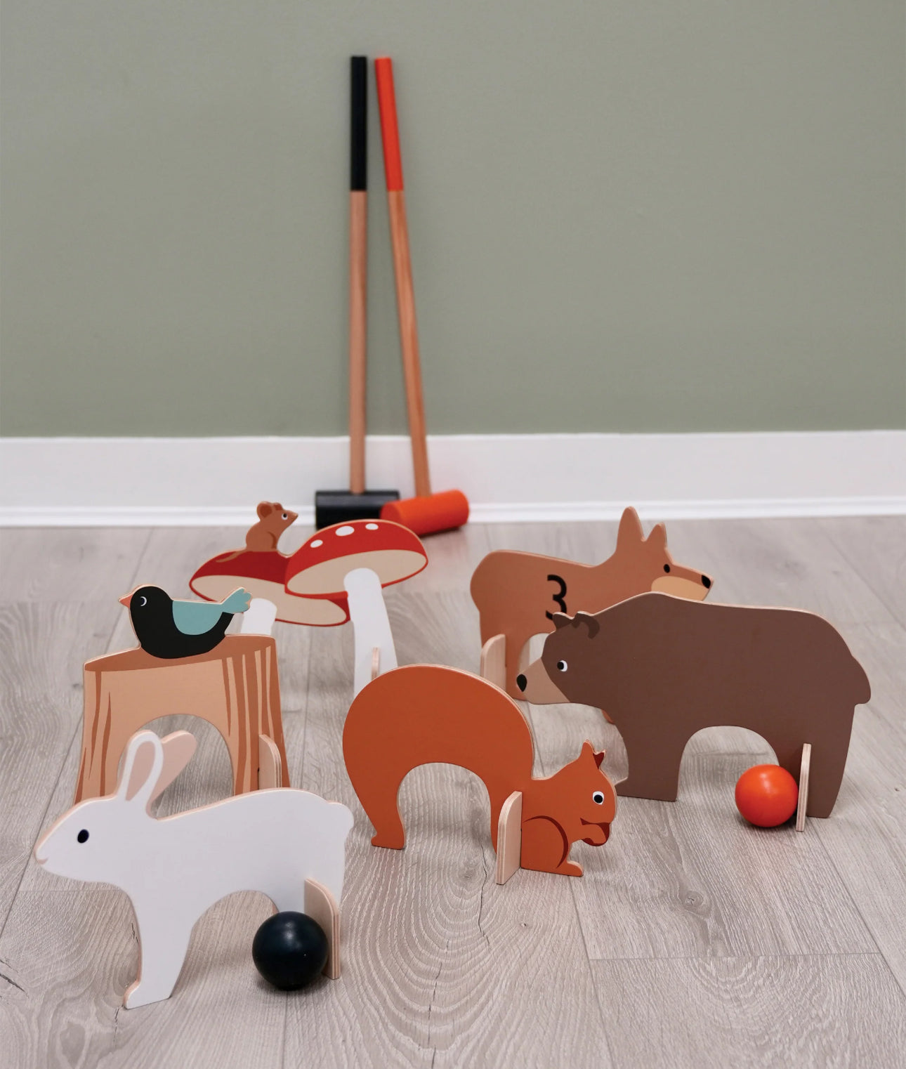 Juego de croquet con animales del bosque